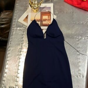 Company Aiden is size 0.Never  worn navy blue. Included hanger